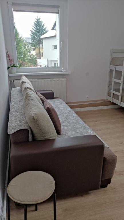 Łóżko lub łóżka w pokoju w obiekcie Dom gościnny "MONIKA"- 10 min do plaży,