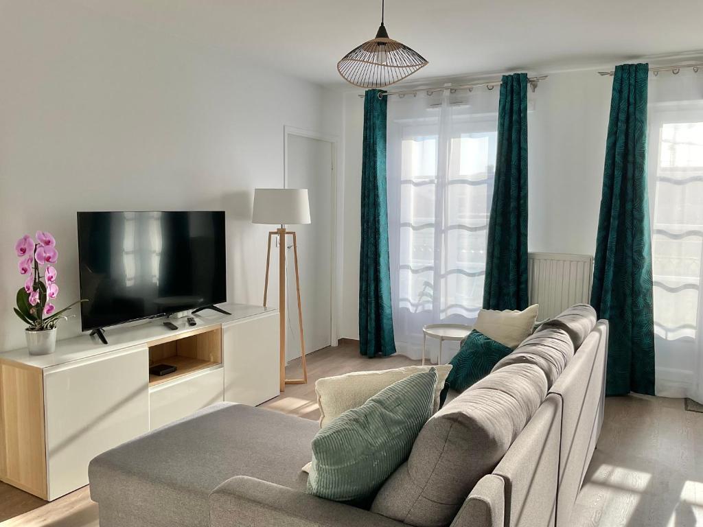 Zona d'estar a Sunny apartment near Disneyland Paris – Liz Appart