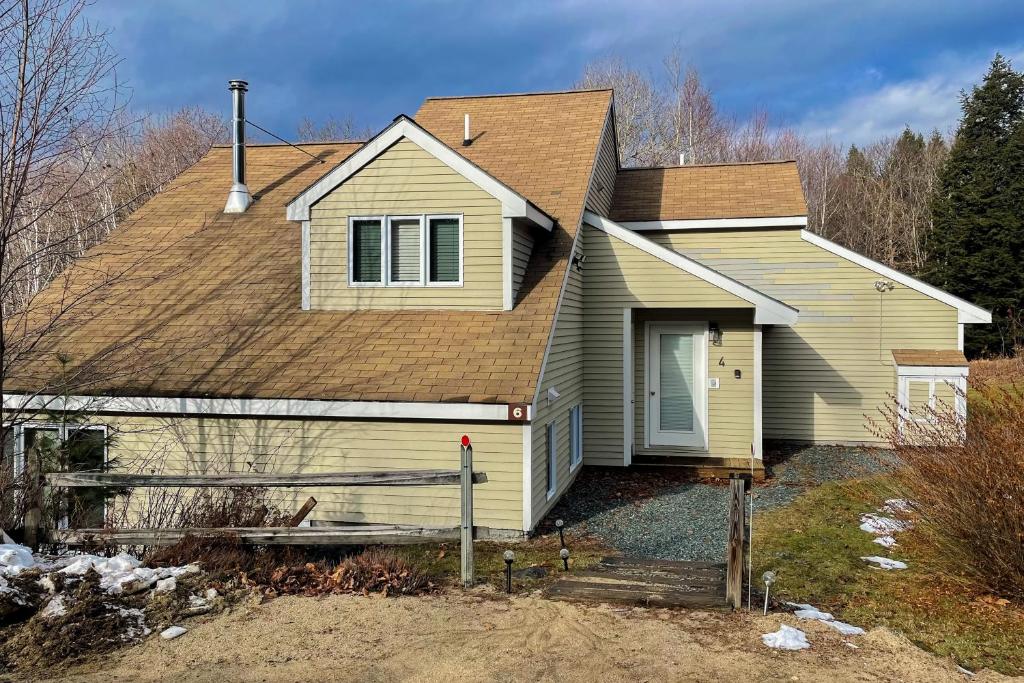 a house with a brown roof at Hibernation Station in Thornton