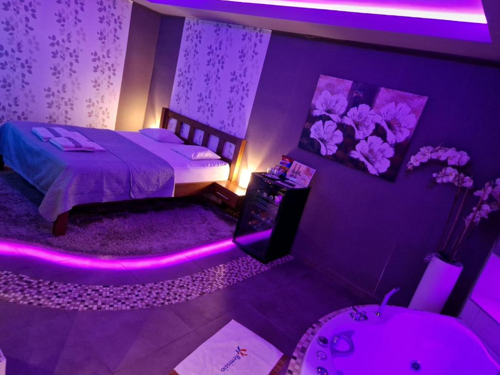 Postel nebo postele na pokoji v ubytování Remissio wellness rooms