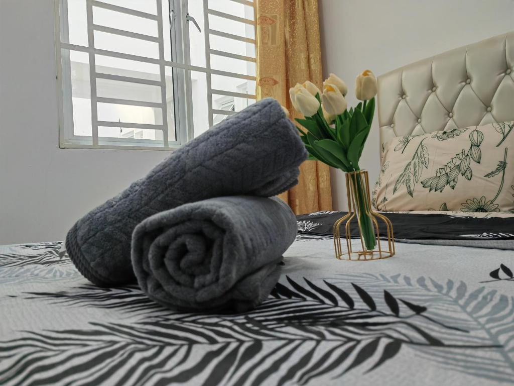 Posezení v ubytování Homestay Pangsapuri Simfoni 3BR 7Pax Kuah Langkawi