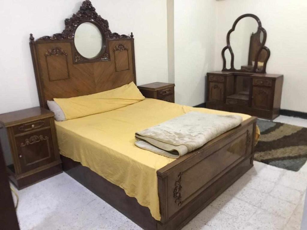 A bed or beds in a room at Buba apartment