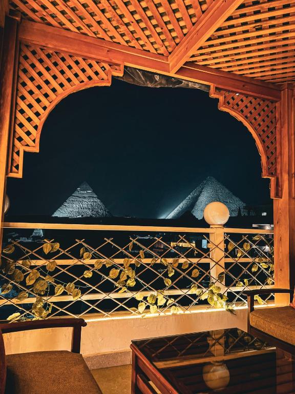 a bunch of wine bottles in a wine rack at Jimmy Pyramids Hotel in Cairo
