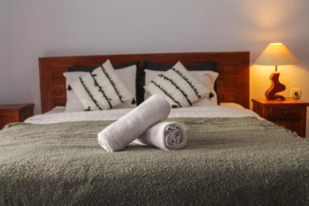 Postel nebo postele na pokoji v ubytování Chua Guest house Canggu