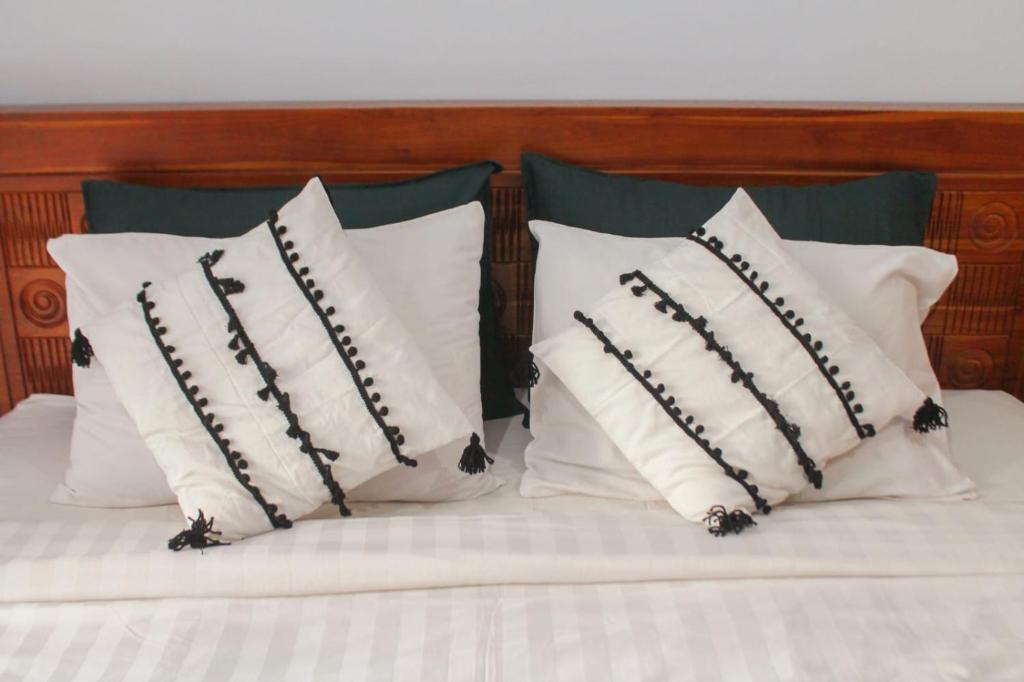 Postel nebo postele na pokoji v ubytování Chua Guest house Canggu