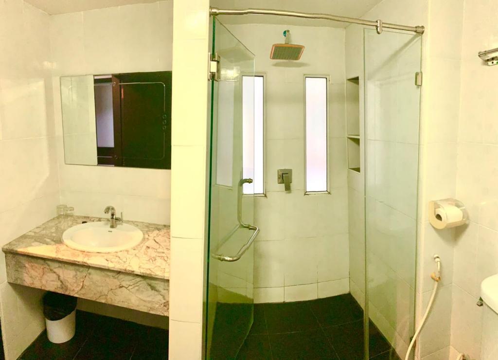 Koupelna v ubytování Tanawit Hotel Hua Hin