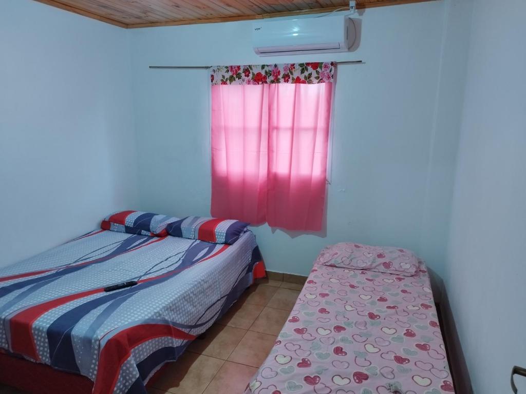 Een bed of bedden in een kamer bij Departamento Máximo