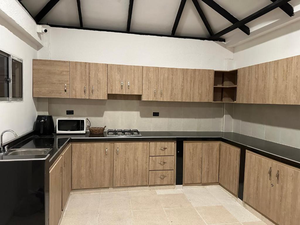 Kuchyň nebo kuchyňský kout v ubytování Casa Gali