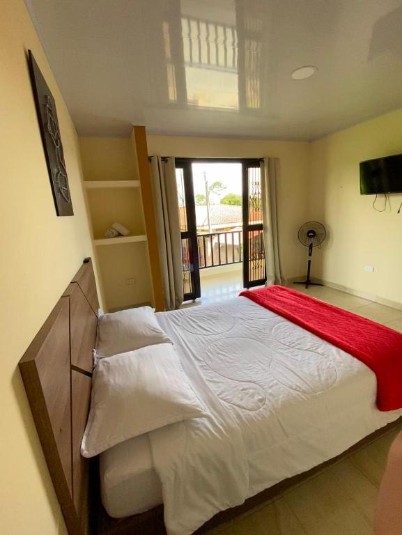 Postel nebo postele na pokoji v ubytování Hotel Casa campestre HH