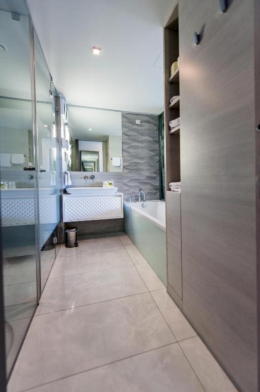 Кровать или кровати в номере Hotel Arupinum