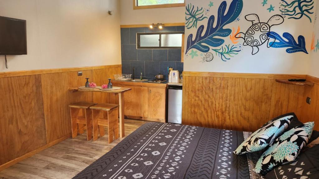 Una cocina o zona de cocina en HARE O HAUPIANO