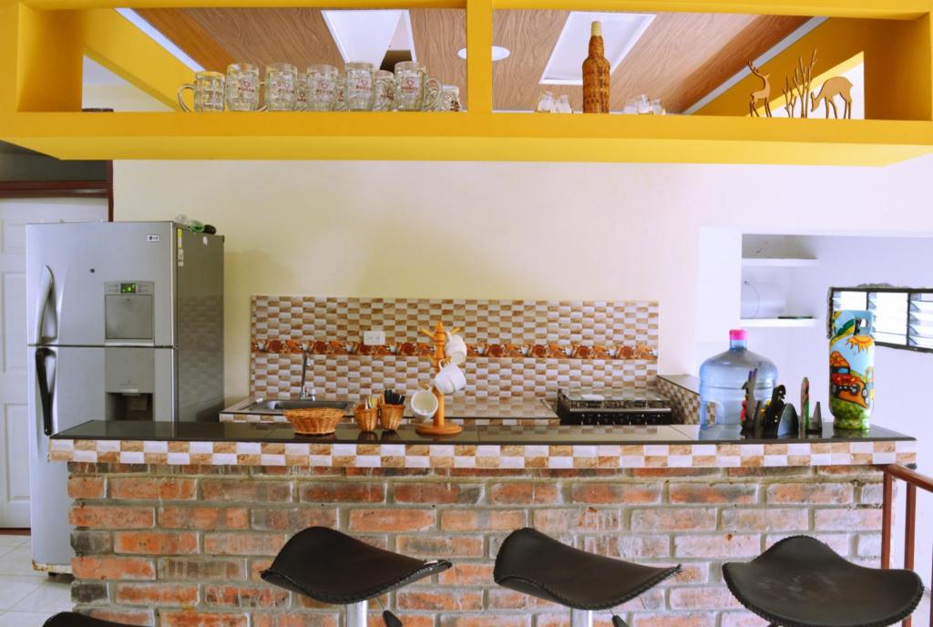 Kuchyň nebo kuchyňský kout v ubytování Hotel Casa campestre HH