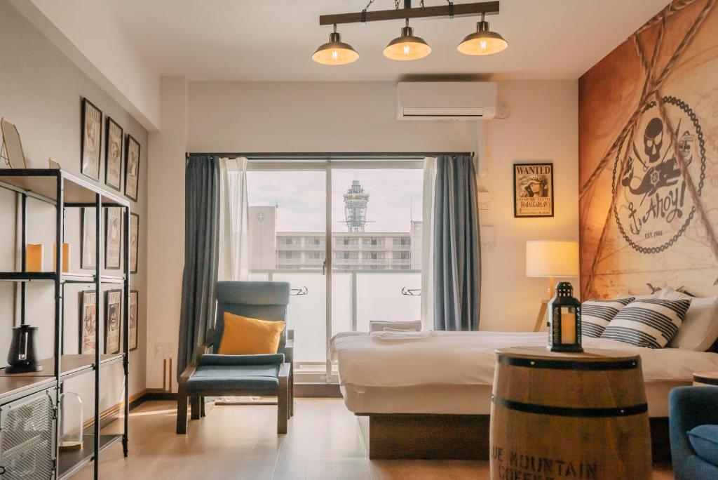 Posezení v ubytování 谷町君 HOTEL 恵美須町72