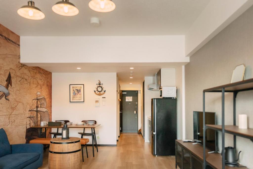 Kuchyň nebo kuchyňský kout v ubytování 谷町君 HOTEL 恵美須町72