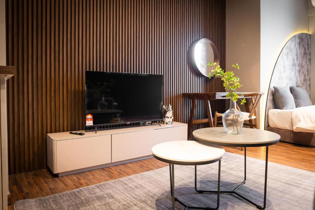 TV a/nebo společenská místnost v ubytování K Avenue by CAIRO