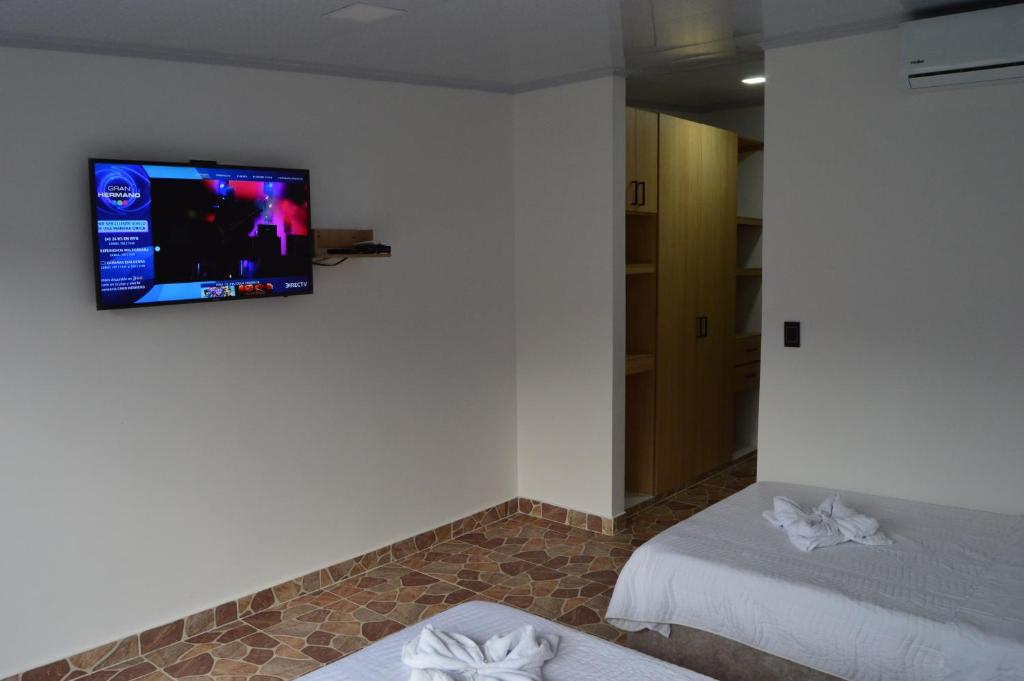 Postel nebo postele na pokoji v ubytování Guacamayas Resort Vacation