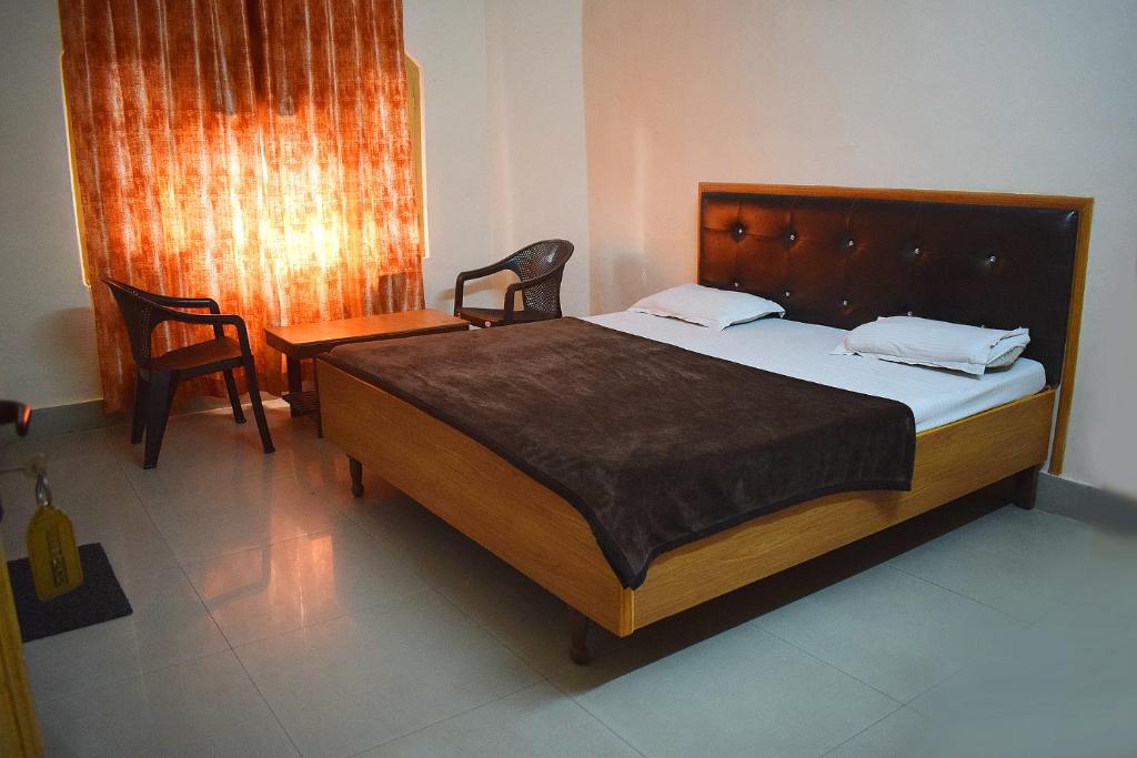 Postel nebo postele na pokoji v ubytování Hotel Golden
