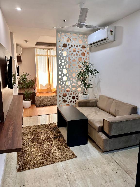 Posezení v ubytování Flamingo Hotel Sector 67 I Studio Rooms I Gurgaon