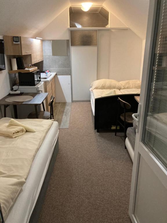 Kuchyň nebo kuchyňský kout v ubytování Apartmany za Rohom