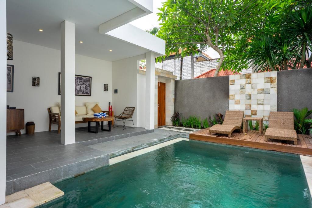 Bazén v ubytování Freddies Resort & Villas Ubud by Kanaya Hospitality nebo v jeho okolí