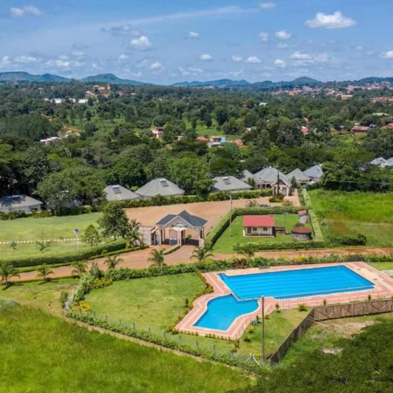 an aerial view of an estate with a swimming pool at Miika Eco Resort Hotel in Hoima