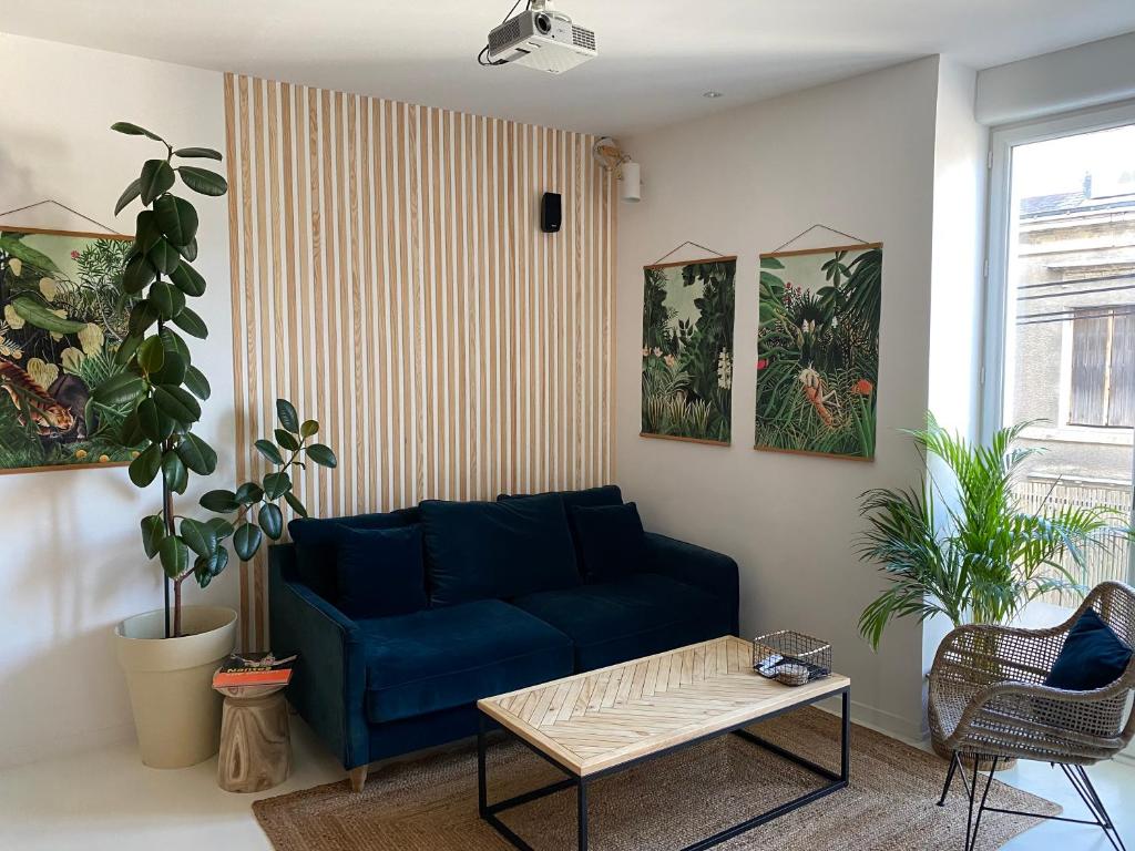 Posezení v ubytování Appartement cosy, Gare 5 minutes et Home cinéma