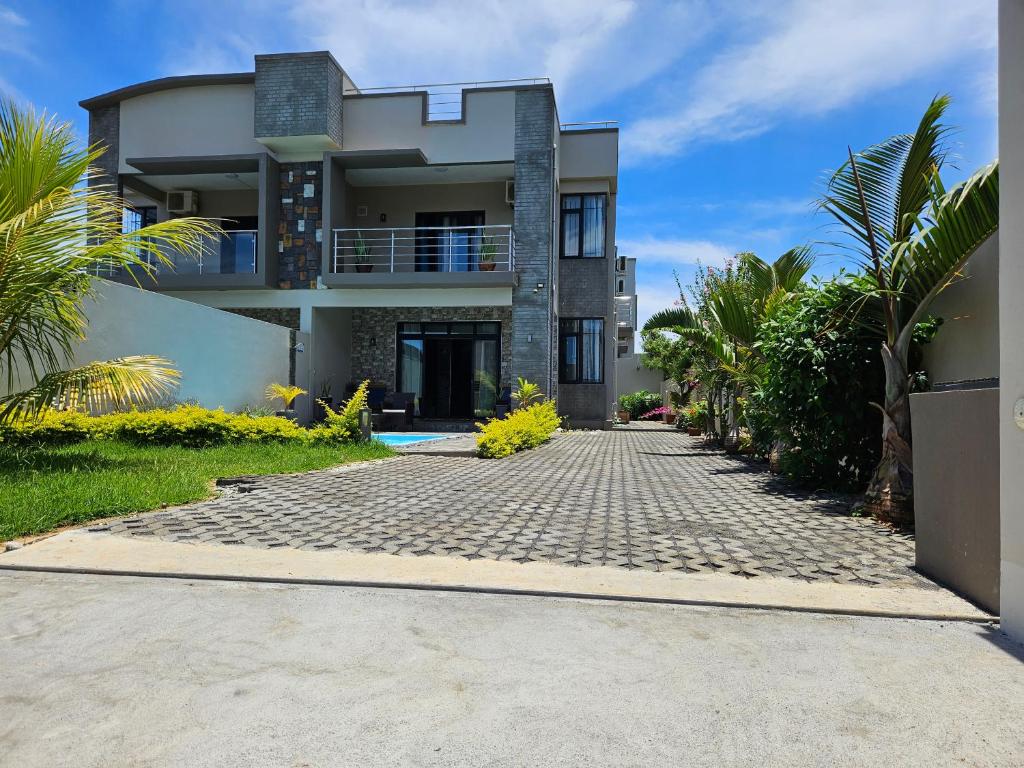 Zahrada ubytování Villa Aahana - Flic en Flac