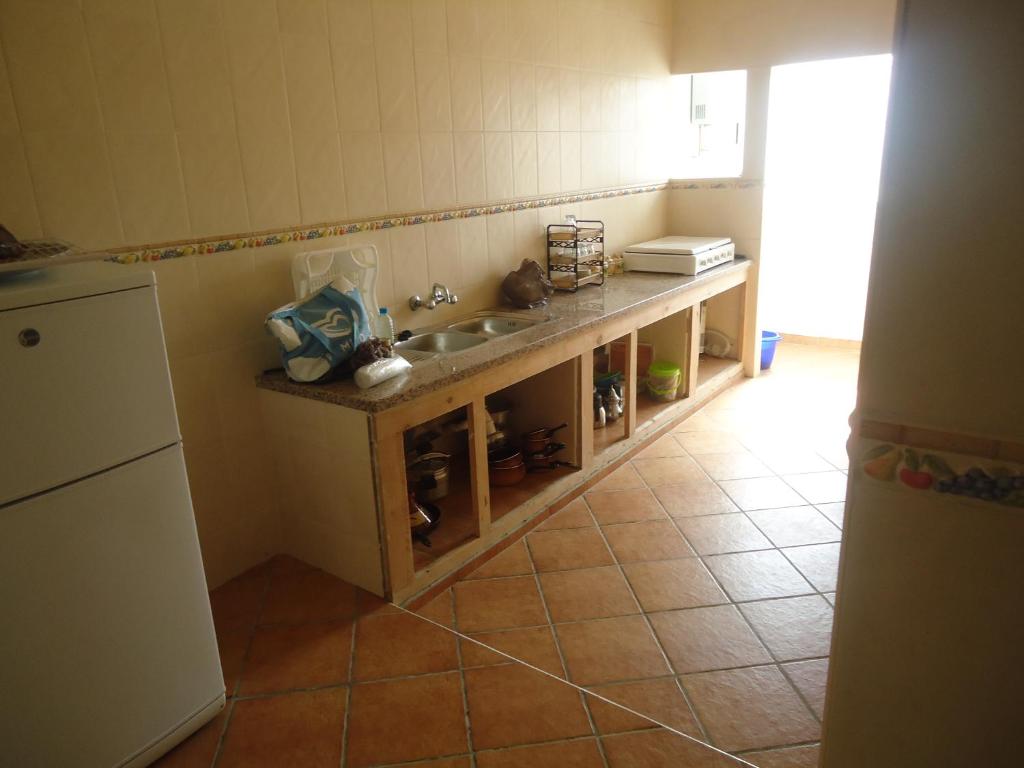Kuchyň nebo kuchyňský kout v ubytování Appartement CORNICHE vue sur MER