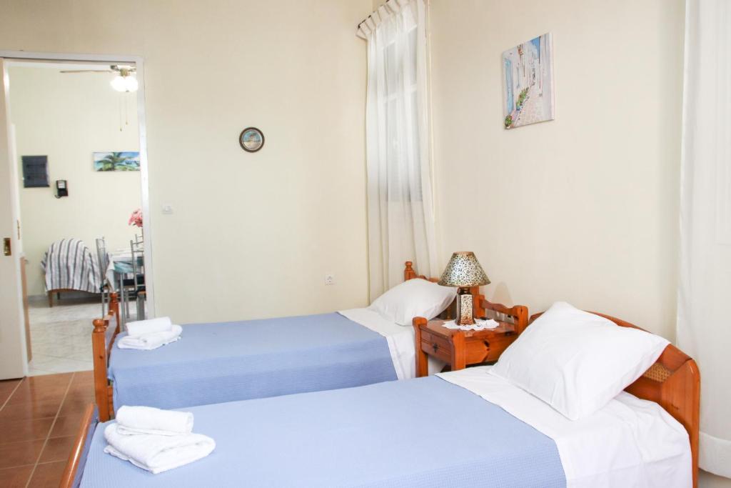 Postel nebo postele na pokoji v ubytování Ellis Apartments