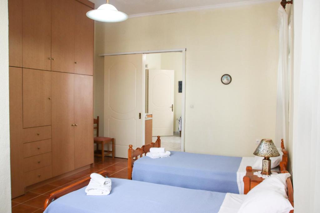Postel nebo postele na pokoji v ubytování Ellis Apartments