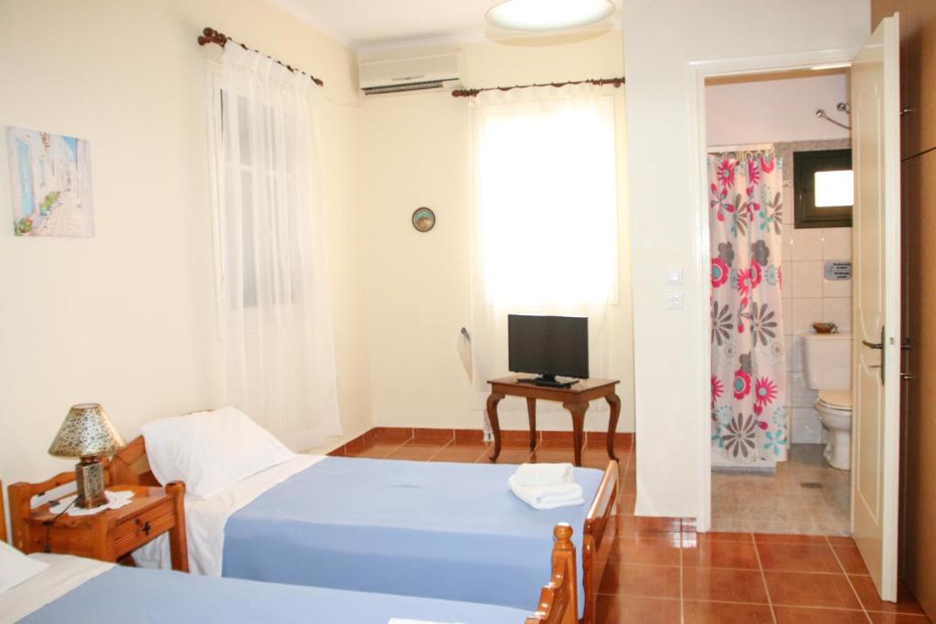 TV a/nebo společenská místnost v ubytování Ellis Apartments
