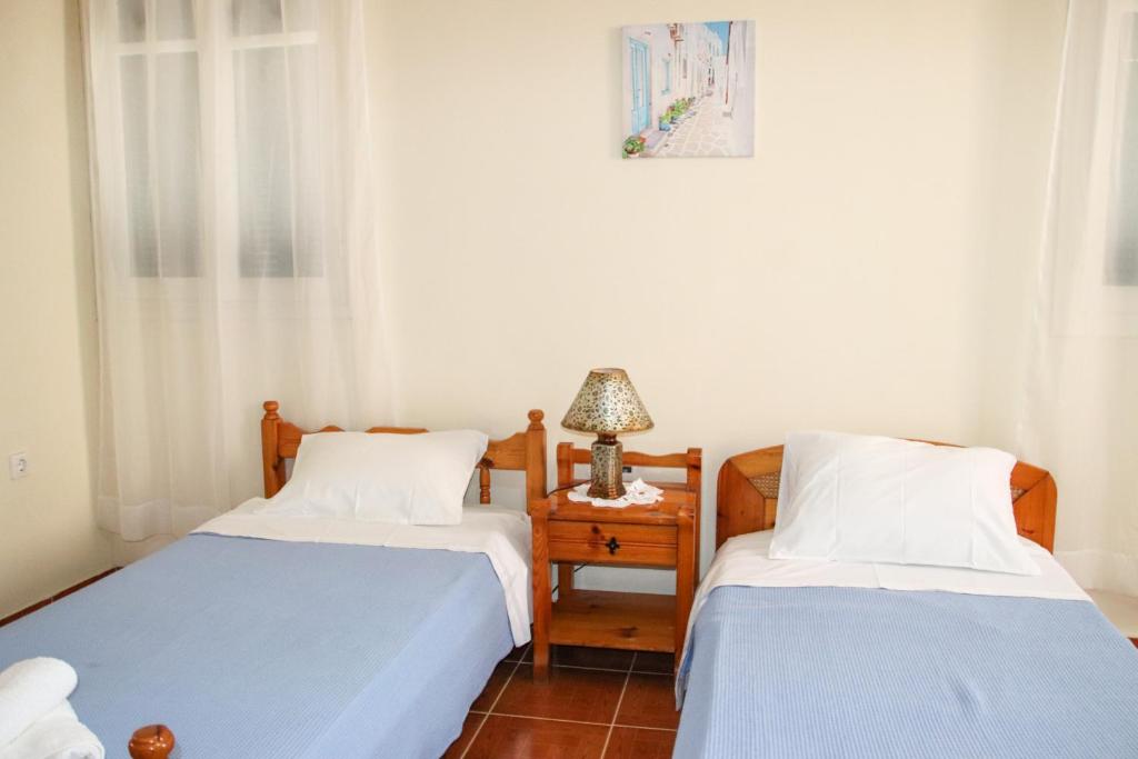 Postel nebo postele na pokoji v ubytování Ellis Apartments