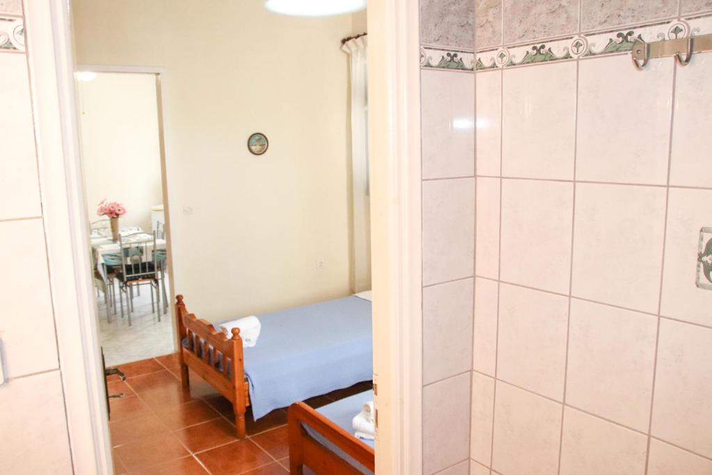Postel nebo postele na pokoji v ubytování Ellis Apartments