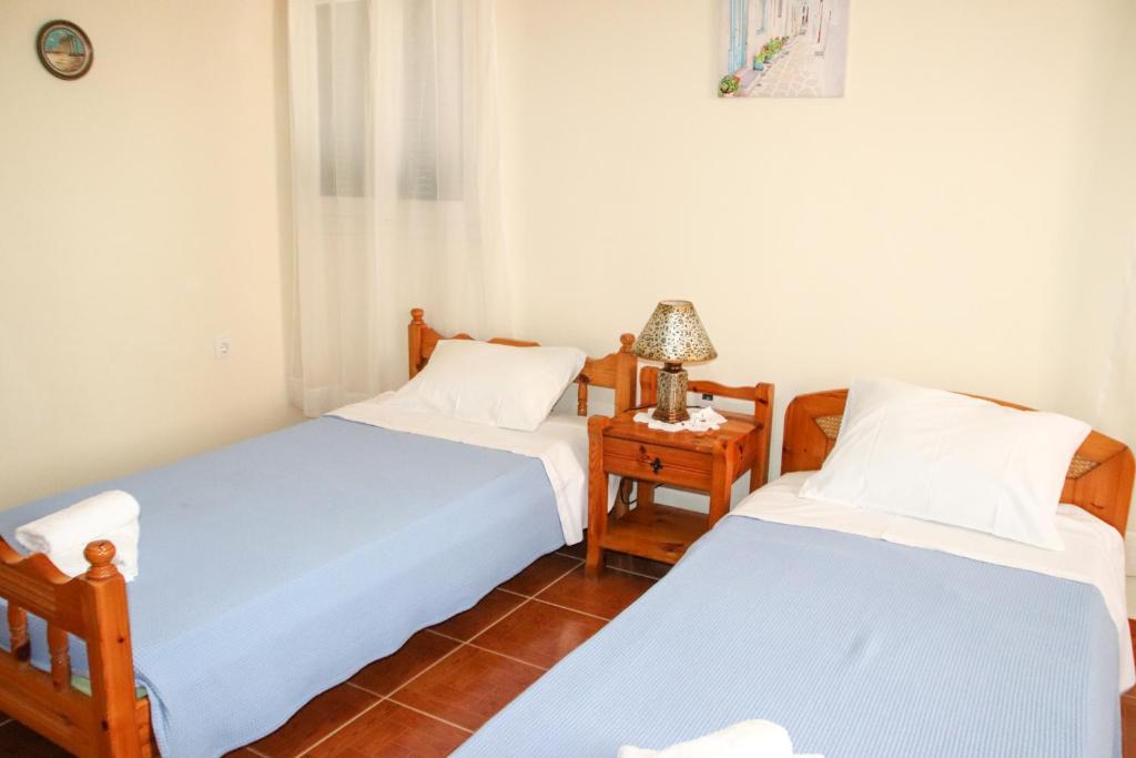 Postel nebo postele na pokoji v ubytování Ellis Apartments