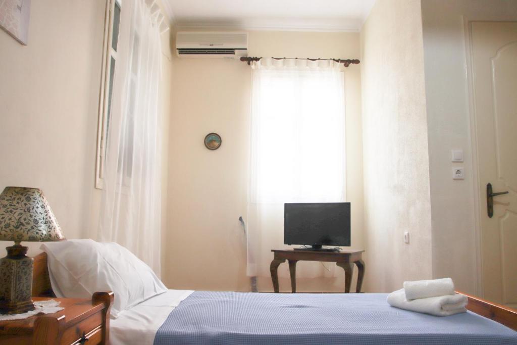 Postel nebo postele na pokoji v ubytování Ellis Apartments