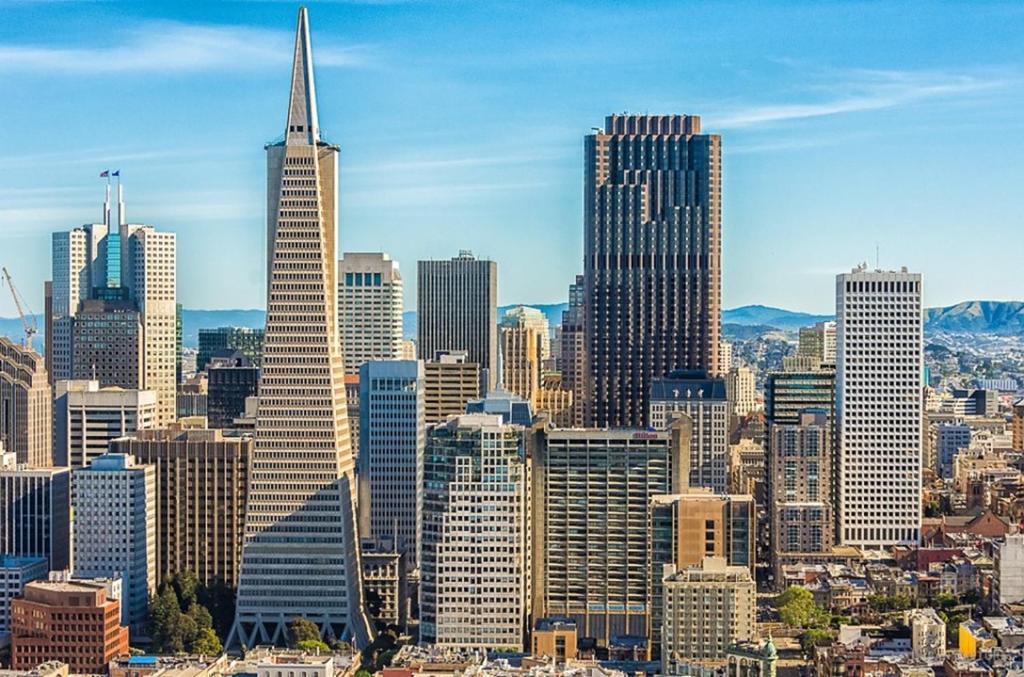 a view of a large city with skyscrapers at Fancy SF Suite, Prime Location, Near Fishermans Wharf, SF Bay and Financial District in San Francisco