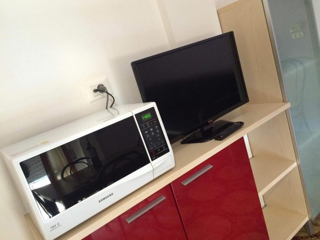 A kitchen or kitchenette at Residence Holiday