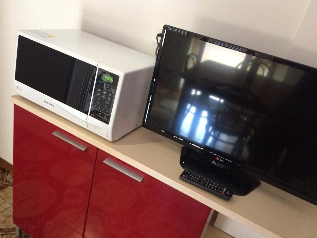 A kitchen or kitchenette at Residence Holiday