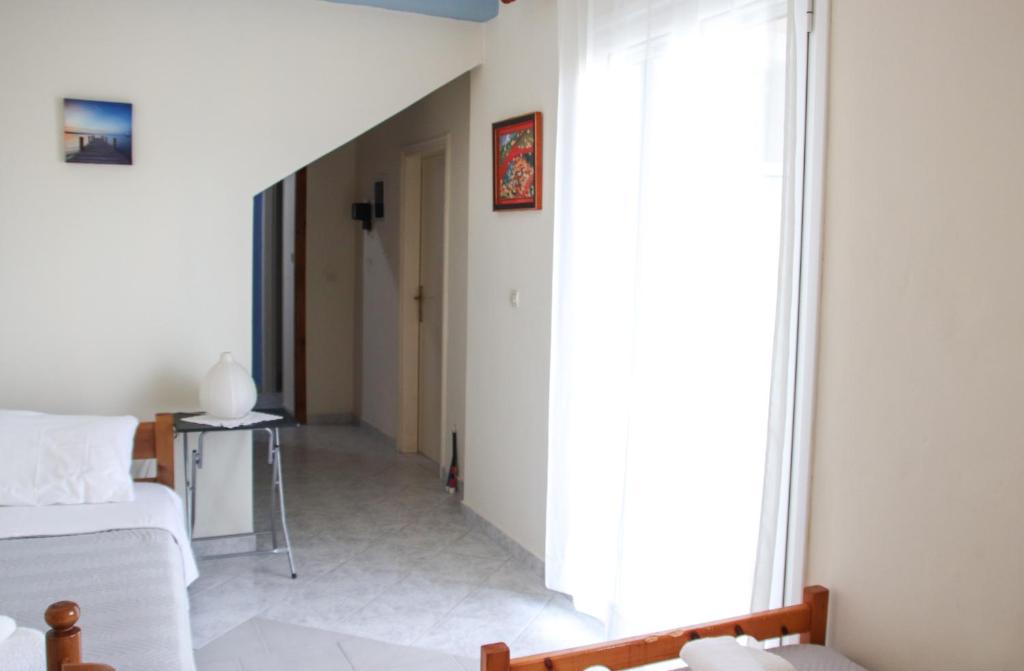 Postel nebo postele na pokoji v ubytování Ellis Apartments