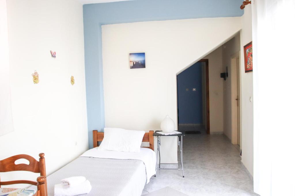 Postel nebo postele na pokoji v ubytování Ellis Apartments