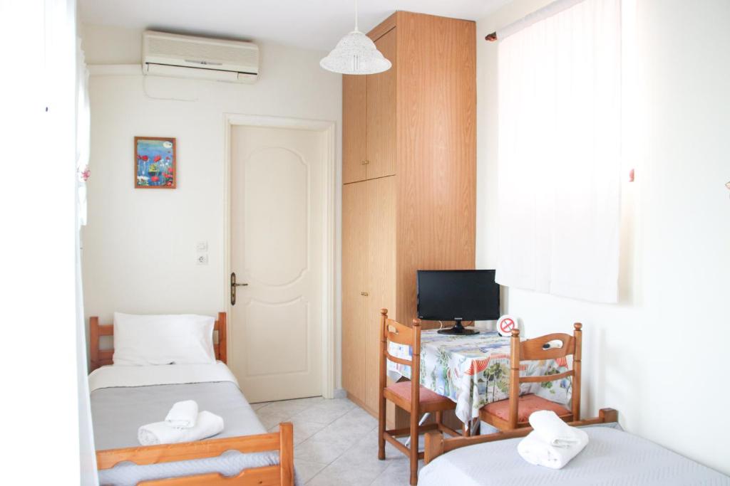 TV a/nebo společenská místnost v ubytování Ellis Apartments