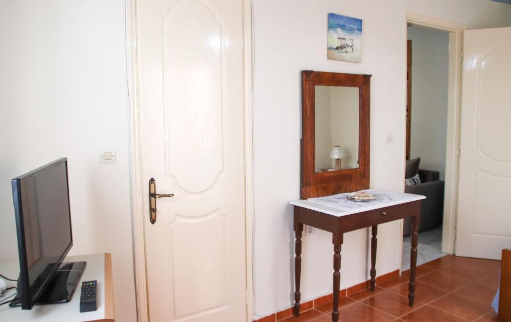 TV a/nebo společenská místnost v ubytování Ellis Apartments