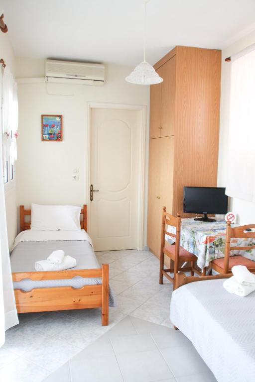 Postel nebo postele na pokoji v ubytování Ellis Apartments