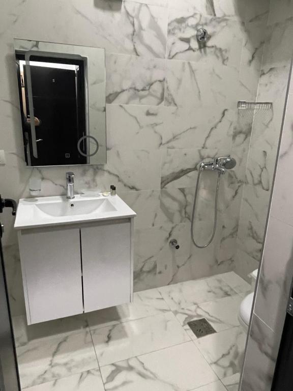 Koupelna v ubytování Ora Apartament