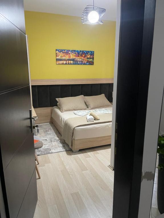Postel nebo postele na pokoji v ubytování Ora Apartament