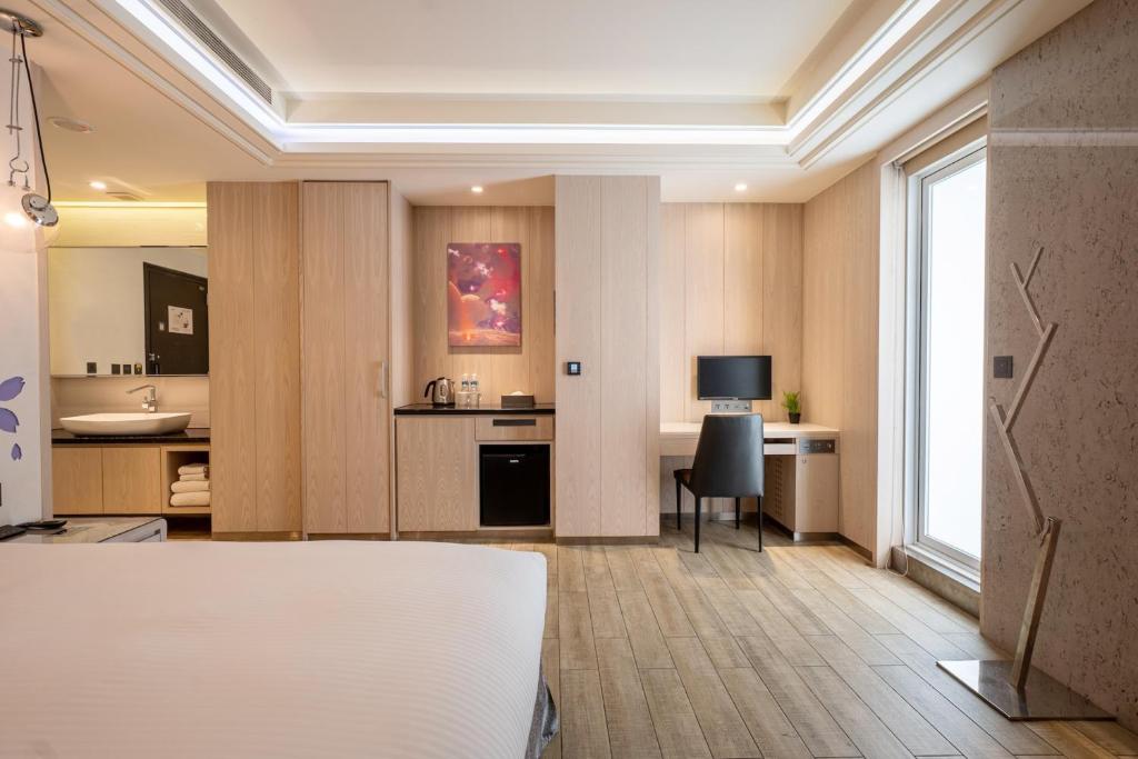 Kuchyň nebo kuchyňský kout v ubytování Guide Hotel Taichung Ziyou