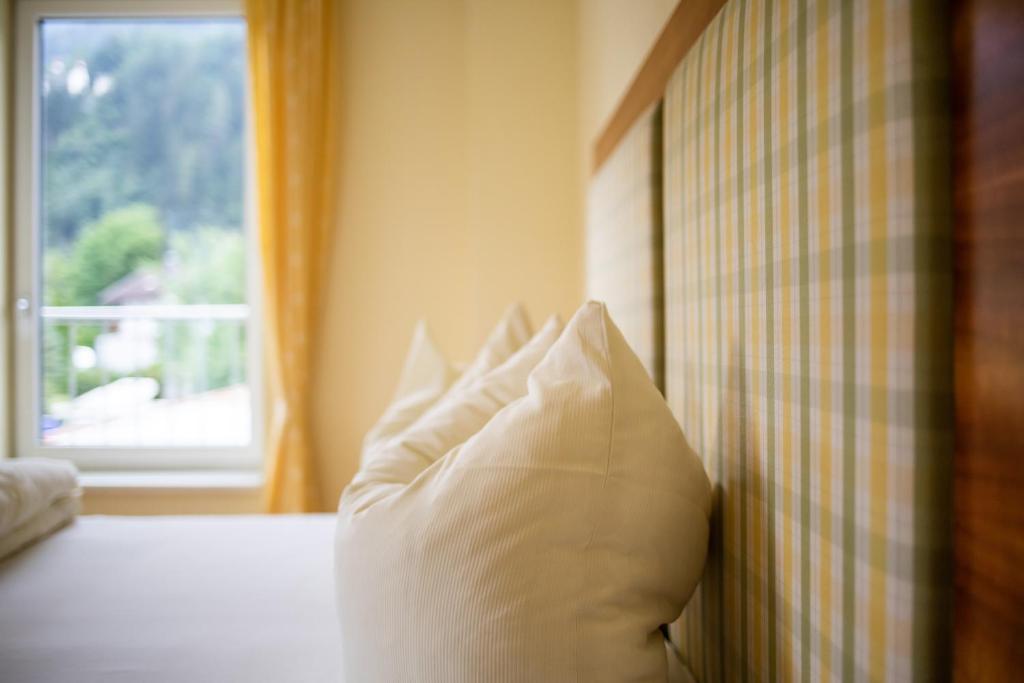 Postel nebo postele na pokoji v ubytování Apparthaus & Chalets Hofer