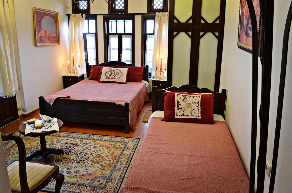 Postel nebo postele na pokoji v ubytování Archontariki Guesthouse