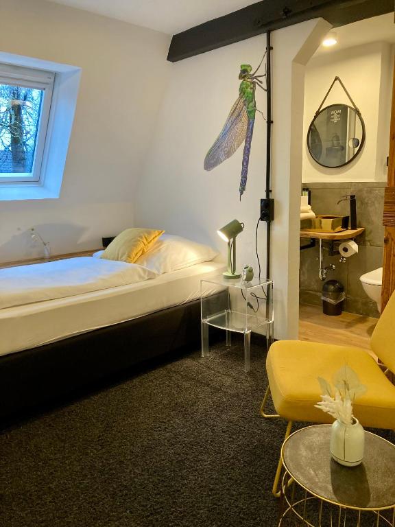 Postel nebo postele na pokoji v ubytování Agli Hotel
