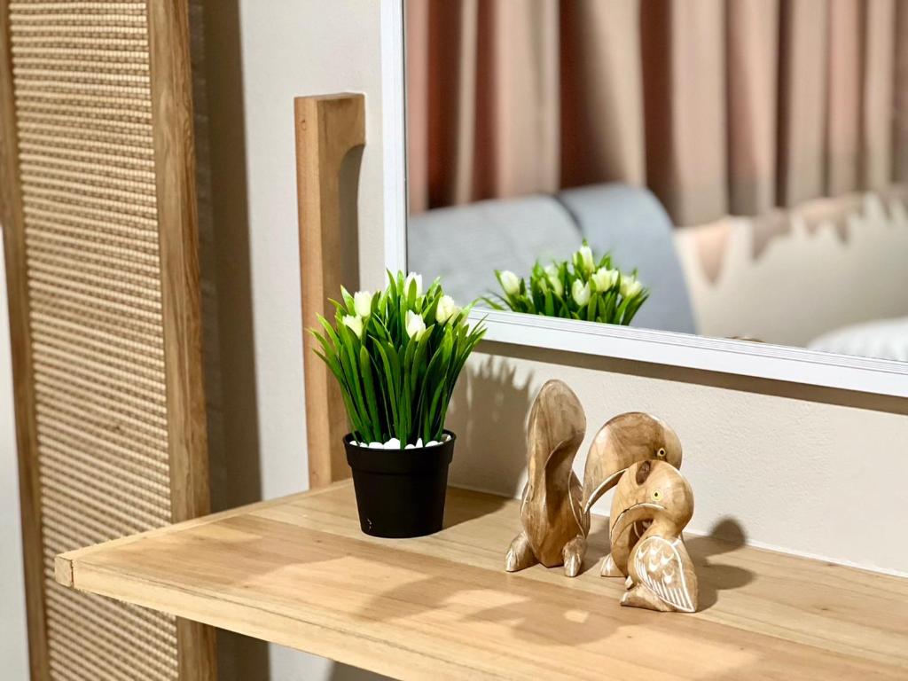 Postel nebo postele na pokoji v ubytování Muji Hotel KrabI